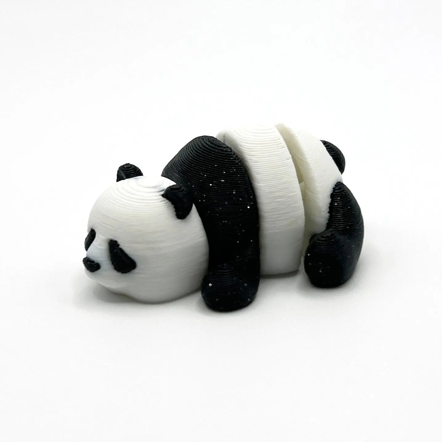 side view of a small 3D printed panda