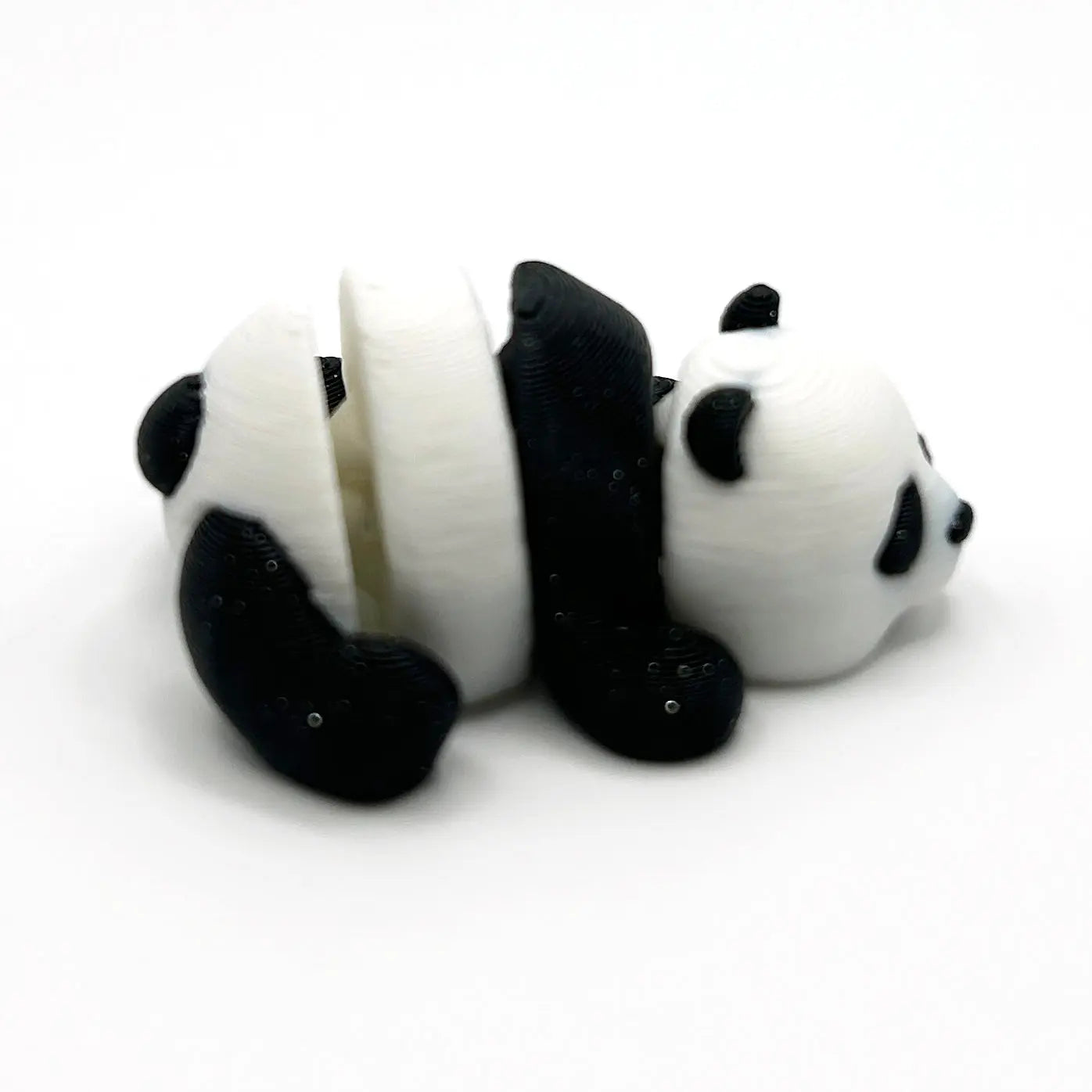 side view of a small 3D printed panda